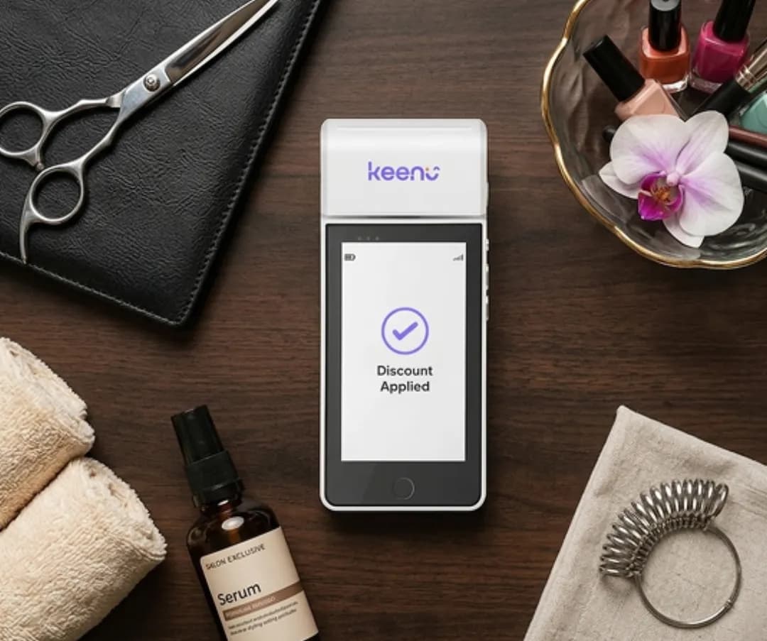 Keenu payment terminal showing Discount Applied on a beauty counter with products
