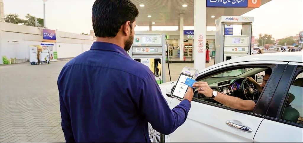 A busy fuel station forecourt